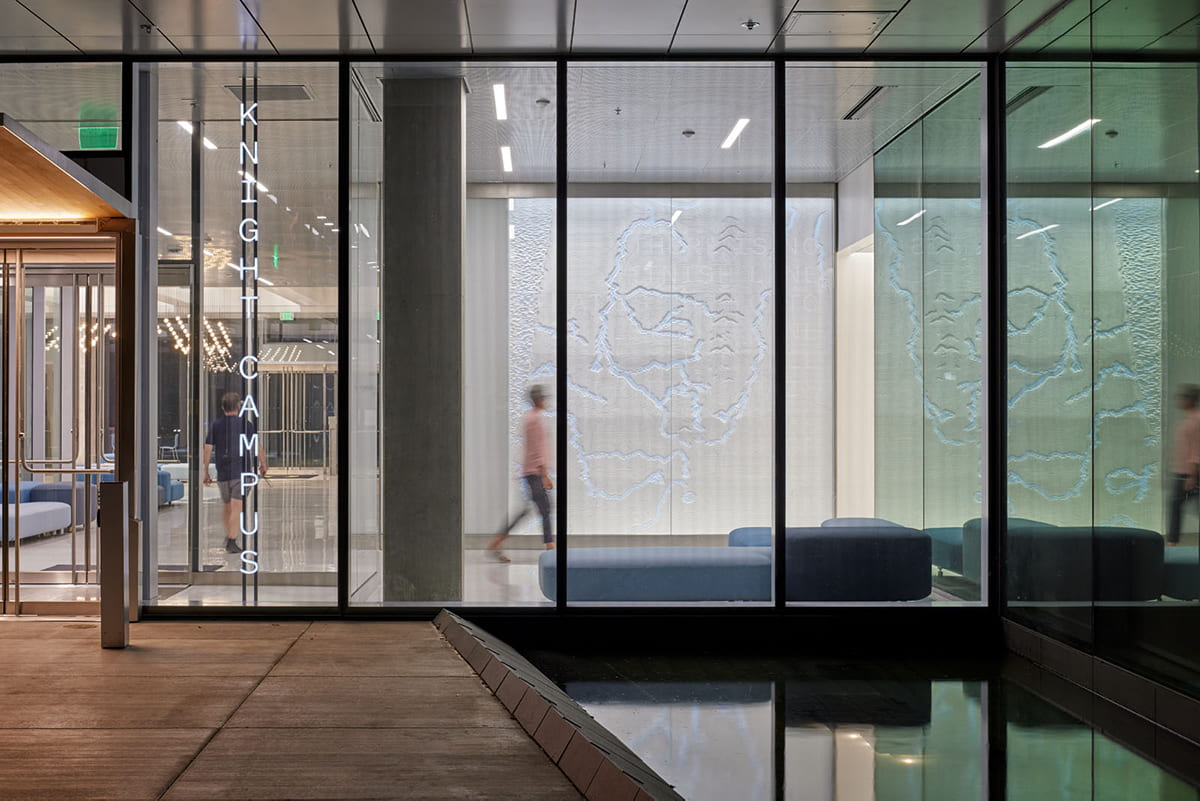 Glass doors with text reading "Knight Campus."